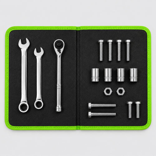 Magnetic mat opened flat with wrenches, a ratchet, sockets and bolts