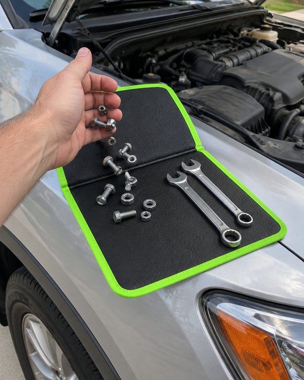 Dropping bolts and nuts onto the magnetic mat